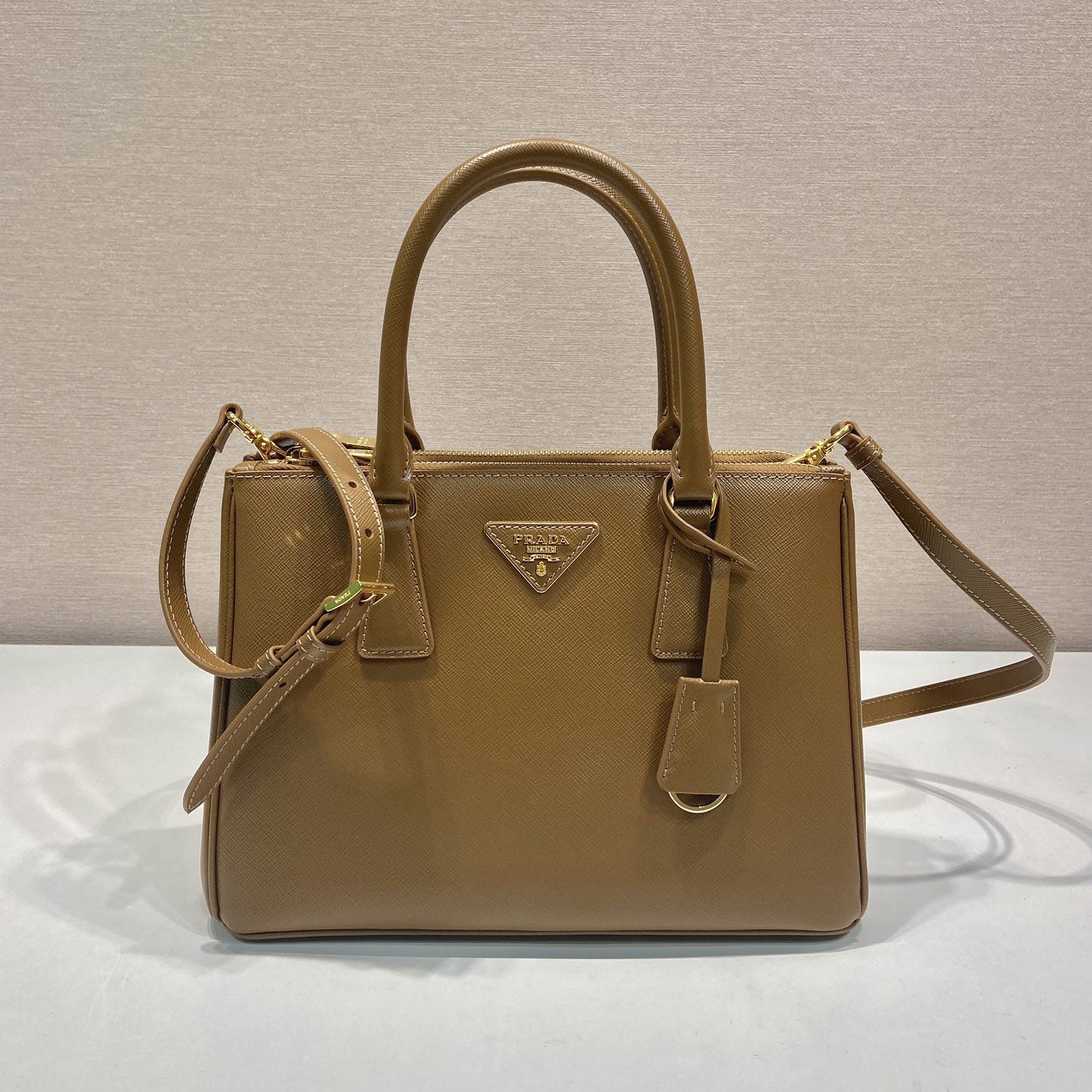 Pra*a top handle bags